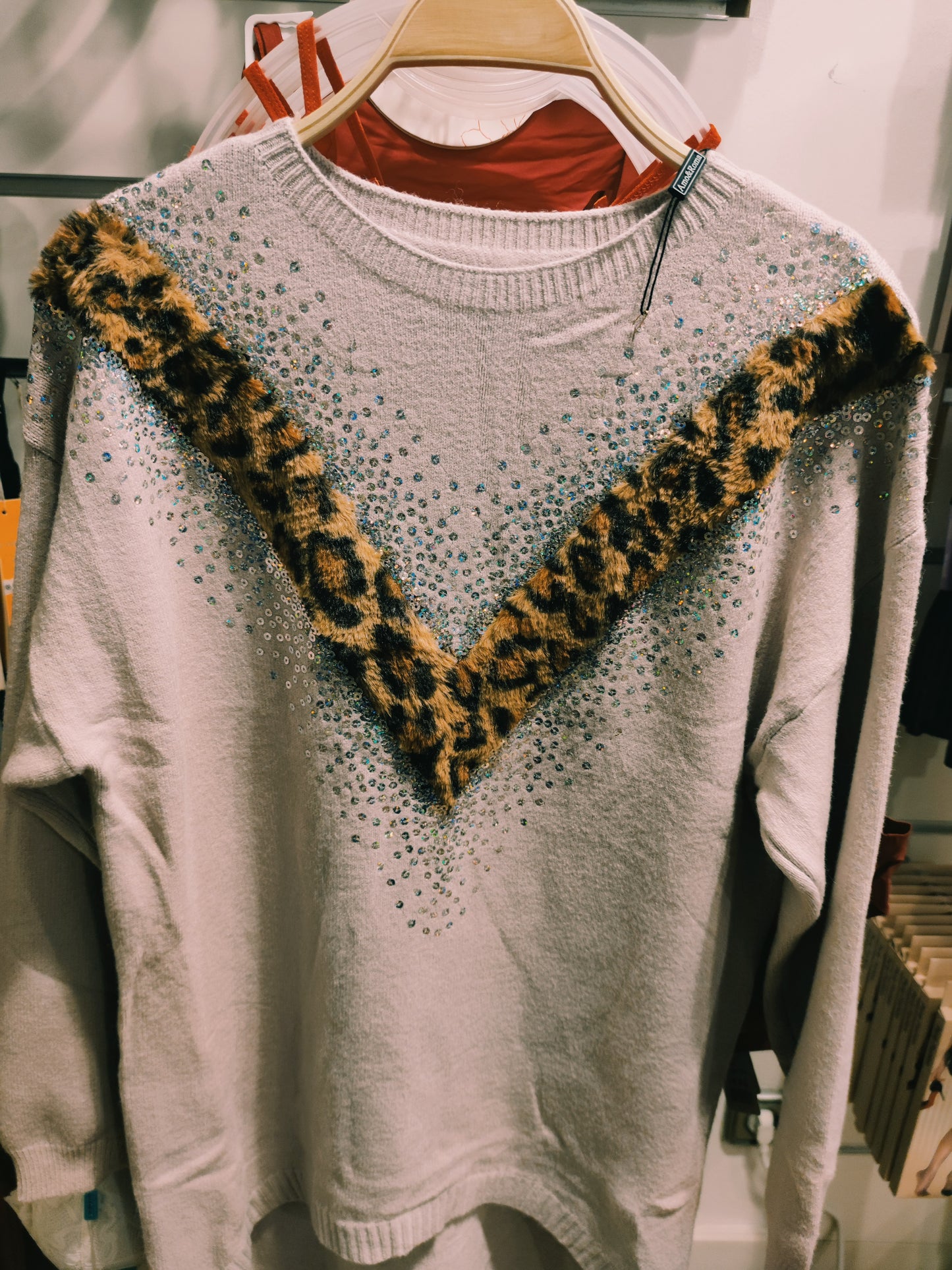 Jersey de punto, tipo vestido con diseño de leopardo con lentejuelas